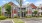 a large brick building with trees in front of it